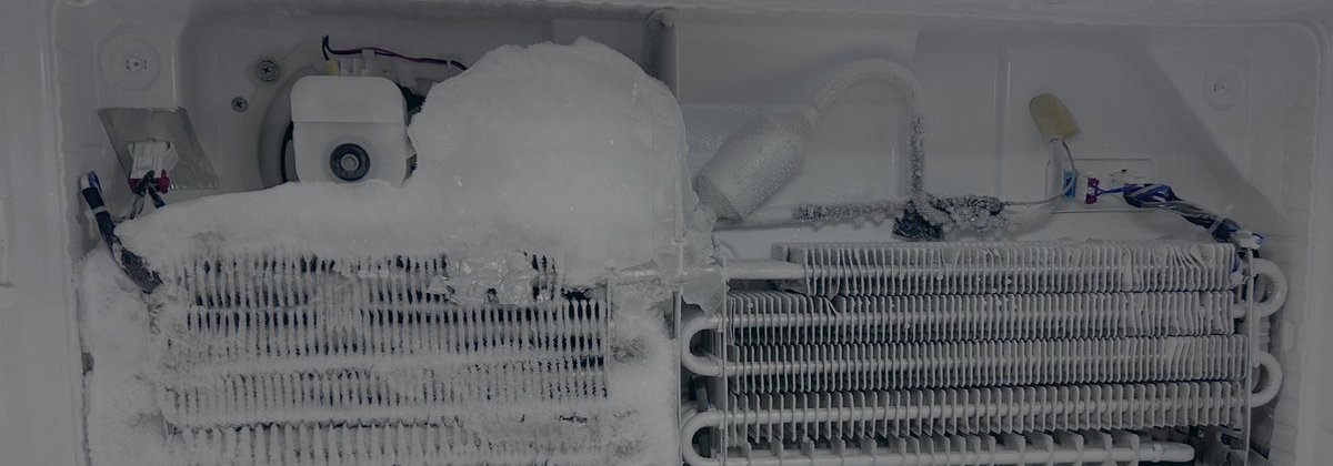 Easy Appliances Repair technician repairing a freezer in a Denver home