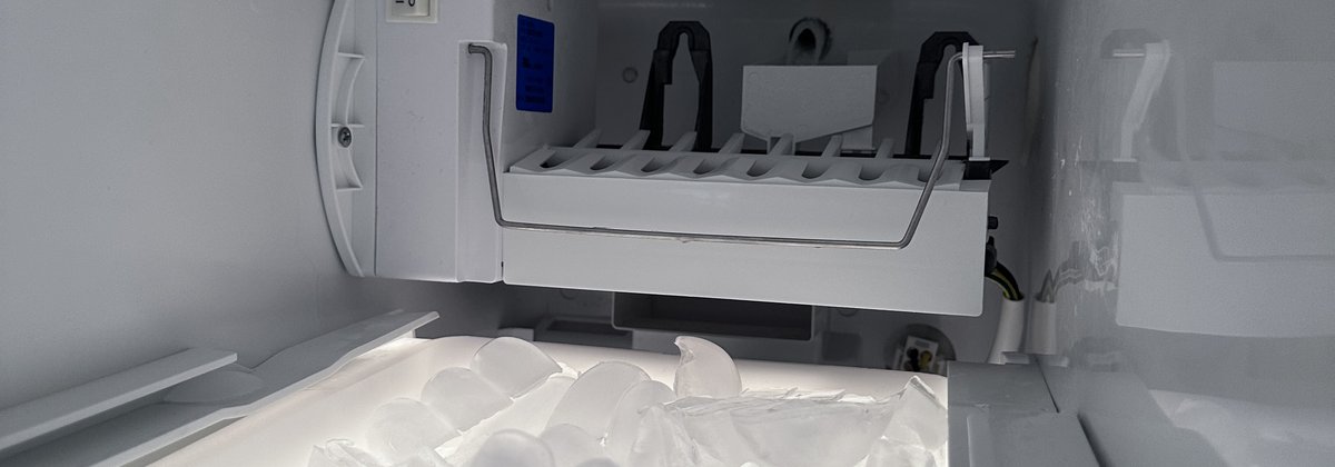 Easy Appliances Repair technician repairing an ice maker in a Denver home